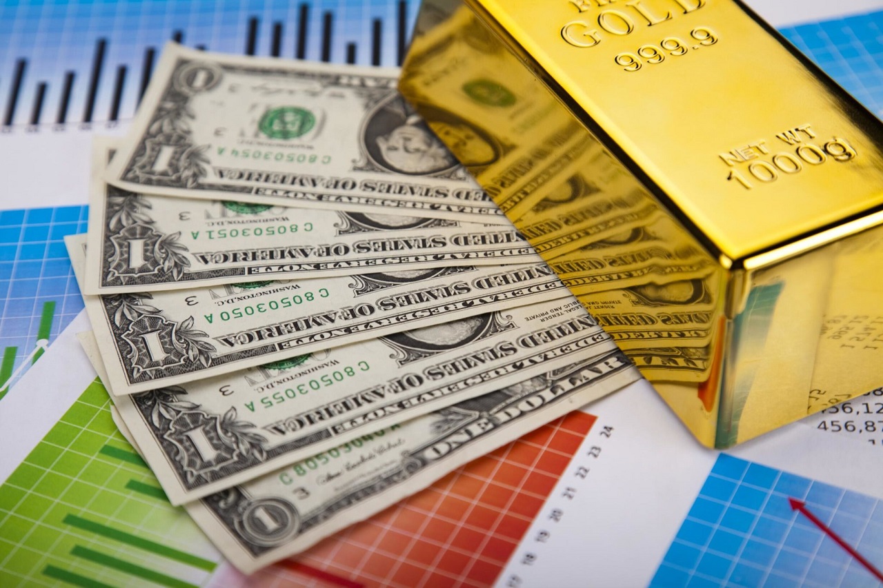 Vàng và USD luôn có quan hệ mật thiết kể cả sau khi bản vị vàng bị xóa bỏ